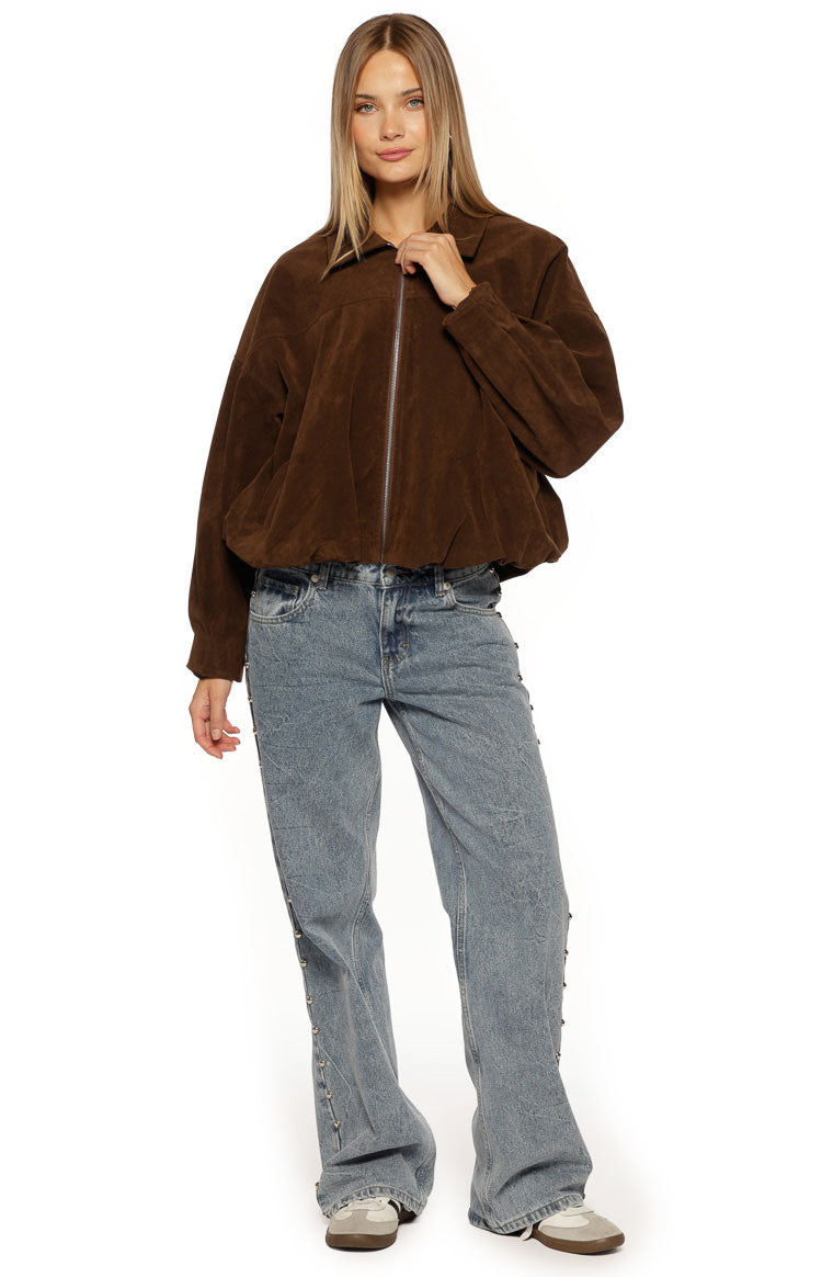 Front view of a relaxed brown suedette bomber jacket with a full zipper and elasticated hem