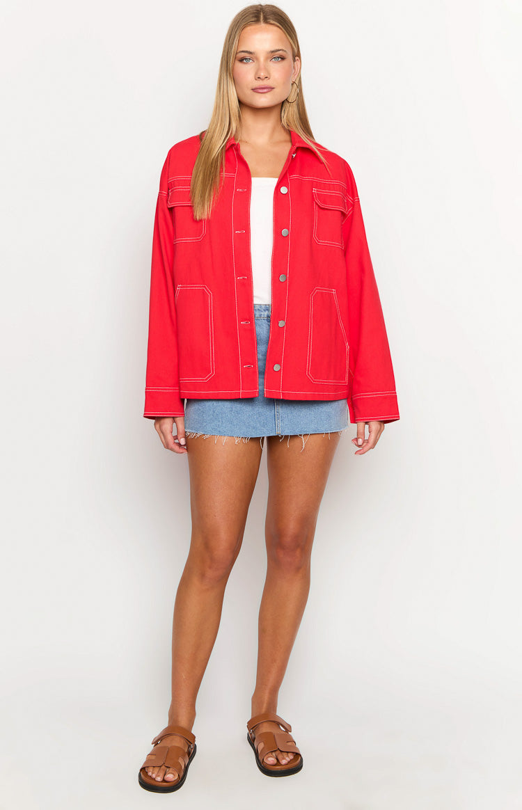 Relaxed fit red denim jacket with white contrast stitching and four large patch pockets