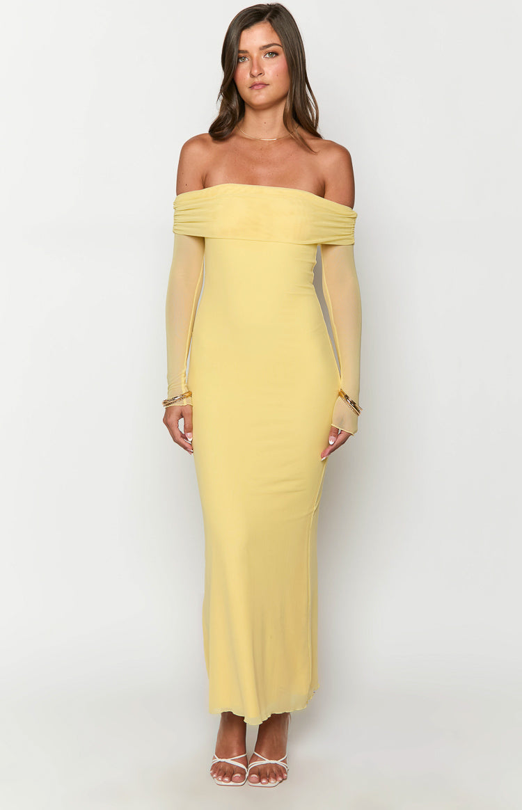 Yellow off-shoulder maxi dress with draped sheer neckline and long sheer sleeves