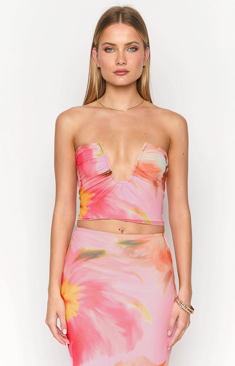 Pink floral strapless crop top with a deep V-neckline and ruched detail
