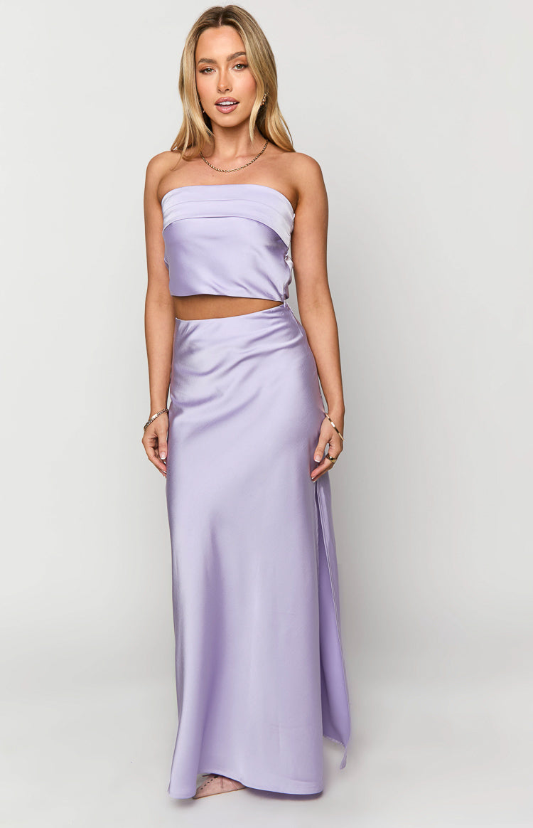 Full length view of a lilac satin maxi skirt with a high side slit