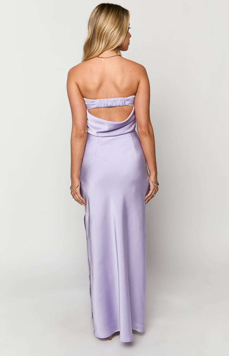 Back view of the lilac satin maxi skirt, showcasing its smooth, flowing fabric and elegant full-length drape