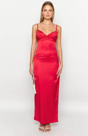 Front view of a red satin maxi dress with a ruched sweetheart neckline, thin spaghetti straps, and a fitted column silhouette