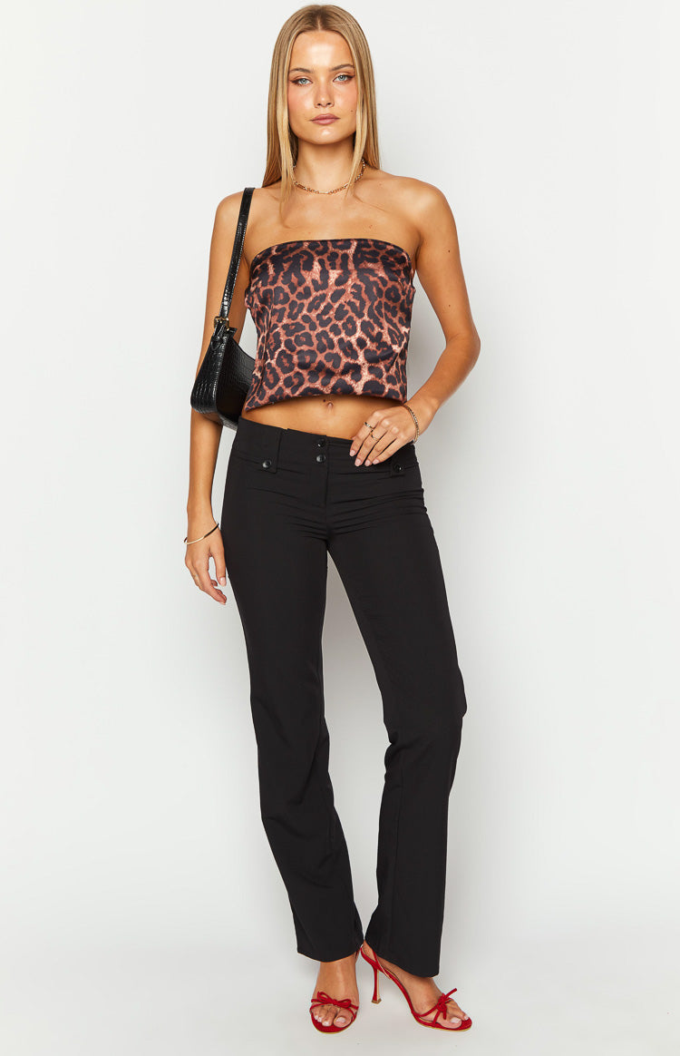 Front view of a brown and black leopard print strapless crop top with a fitted silhouette