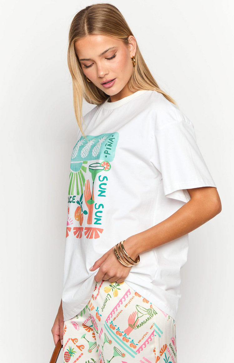 White short sleeve tee with a colourful chest graphic featuring pineapples, cocktails, and 'SUN SUN' text