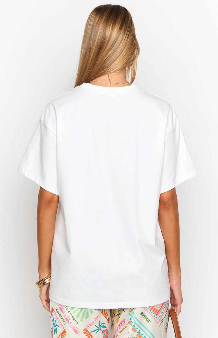 Rear view of a white oversized tee with a relaxed fit, crew neck, and dropped short sleeves