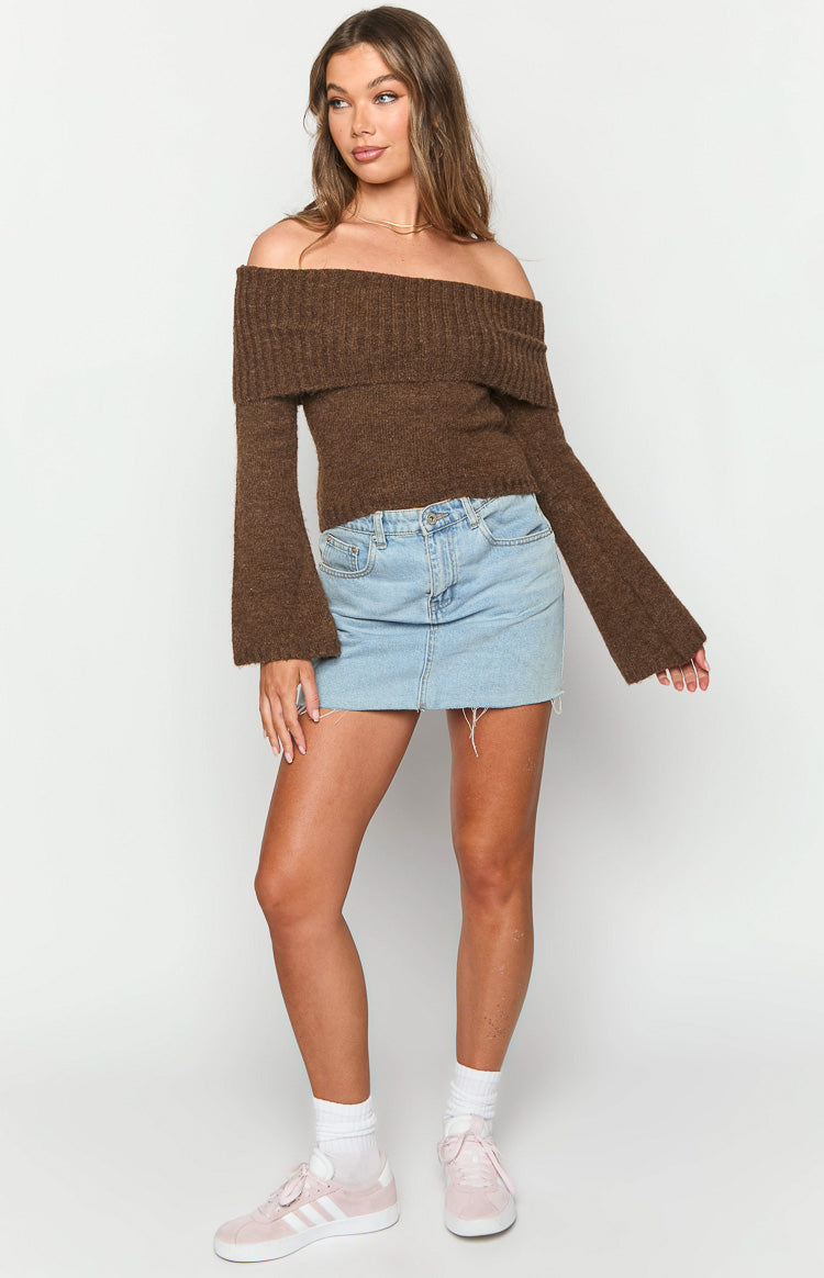 Brown off-shoulder knit sweater with a wide ribbed fold-over neckline and long flared sleeves