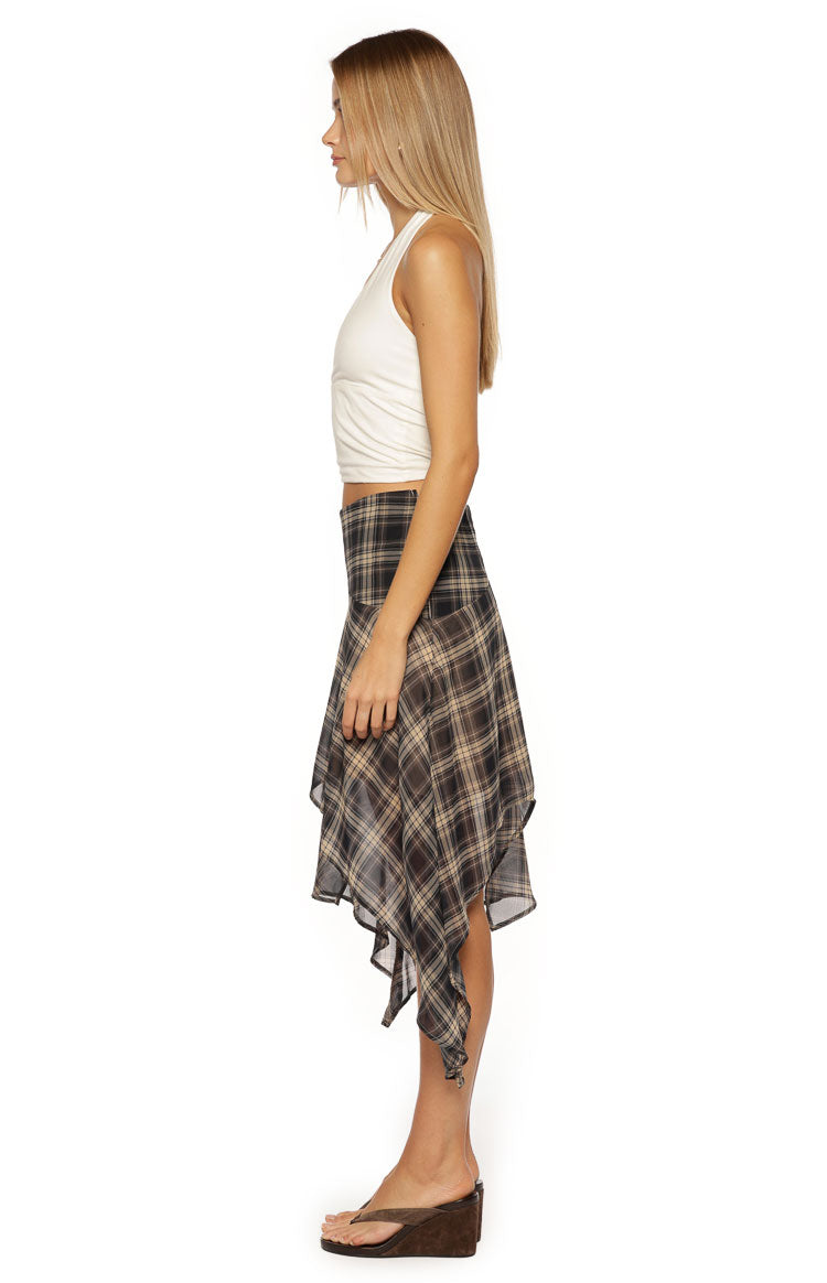 Side view of a brown and beige plaid midi skirt with a flowing hanky hem