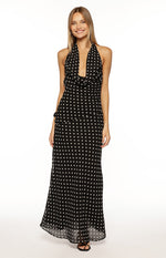 Black polka dot maxi dress with a deep V-neck cowl halter and ruched side detail