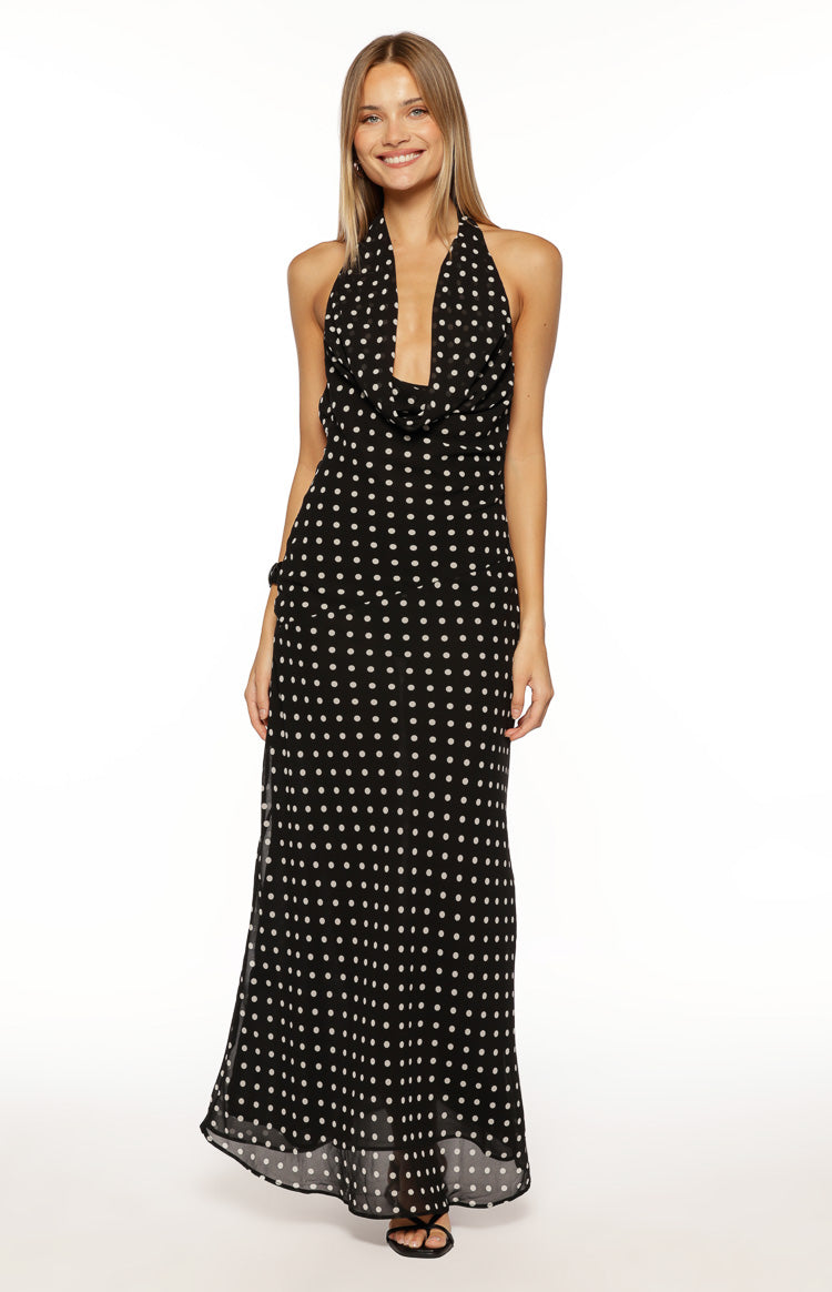 Black polka dot maxi dress with a deep V-neck cowl halter and ruched side detail