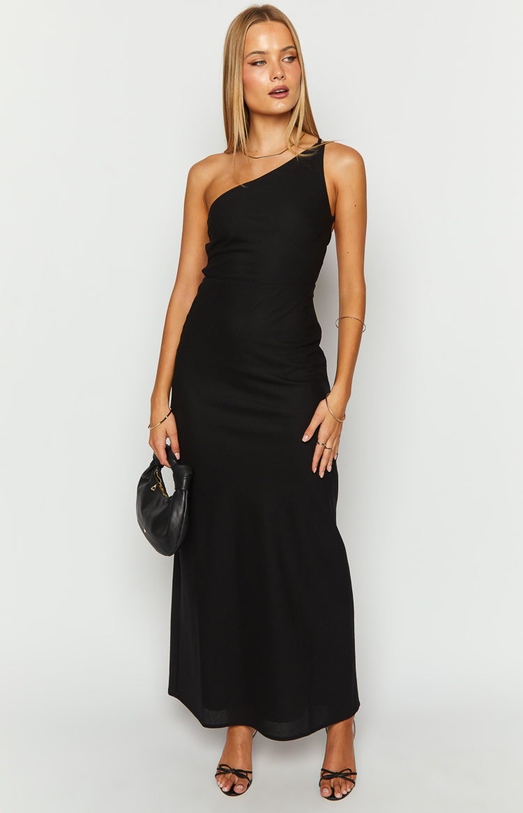 Front view of a black one-shoulder linen blend maxi dress with a fitted bodice and flowing skirt