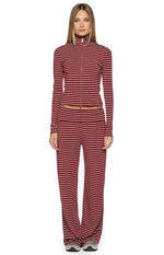 Full length view of burgundy and white striped wide leg pants with a wide flat waistband
