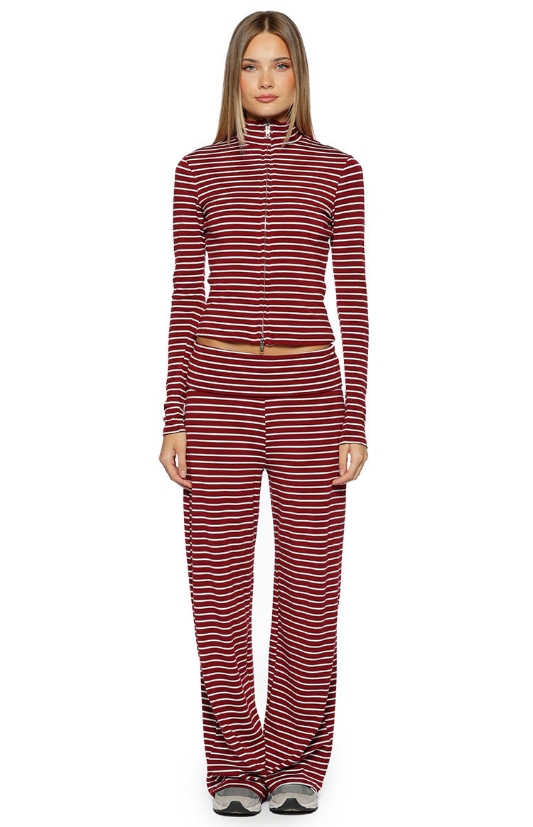 Full length view of burgundy and white striped wide leg pants with a wide flat waistband