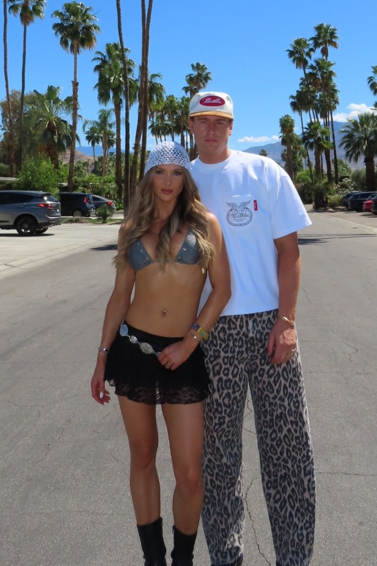 Front view of a grey sparkle eyelet triangle bikini top with thin adjustable straps