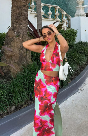 Beginning Boutique Elsa Green Floral Halter Top green and pink floral print halter neck crop top with a deep V-neckline