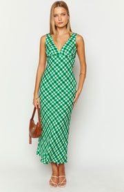 Green and cream check maxi dress with a V-neckline and a flowing bias-cut skirt