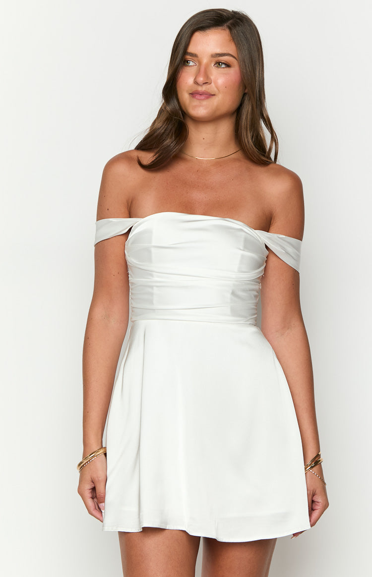 White off-shoulder mini dress with a draped neckline and ruched bodice