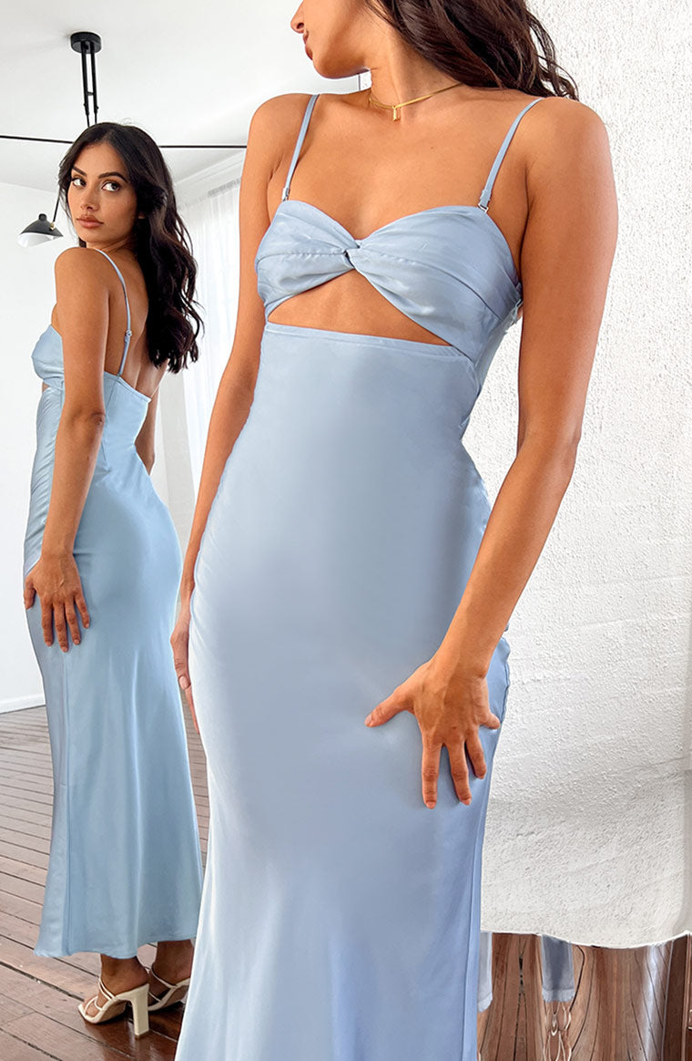 Close-up front view of a light blue satin maxi dress featuring a twisted knot bust, thin spaghetti straps, and side waist cutouts