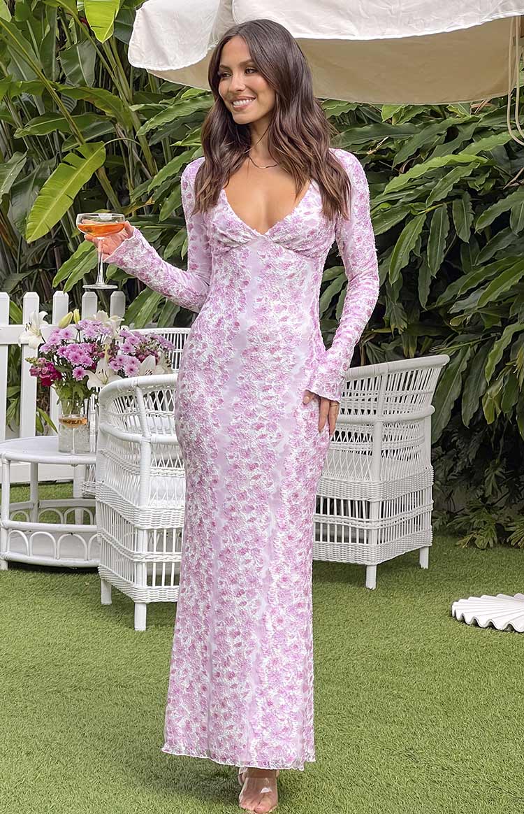Beginning Boutique Zach Pink Long Sleeve Maxi Dress pink long sleeve maxi dress with white floral print and ruched sweetheart neckline