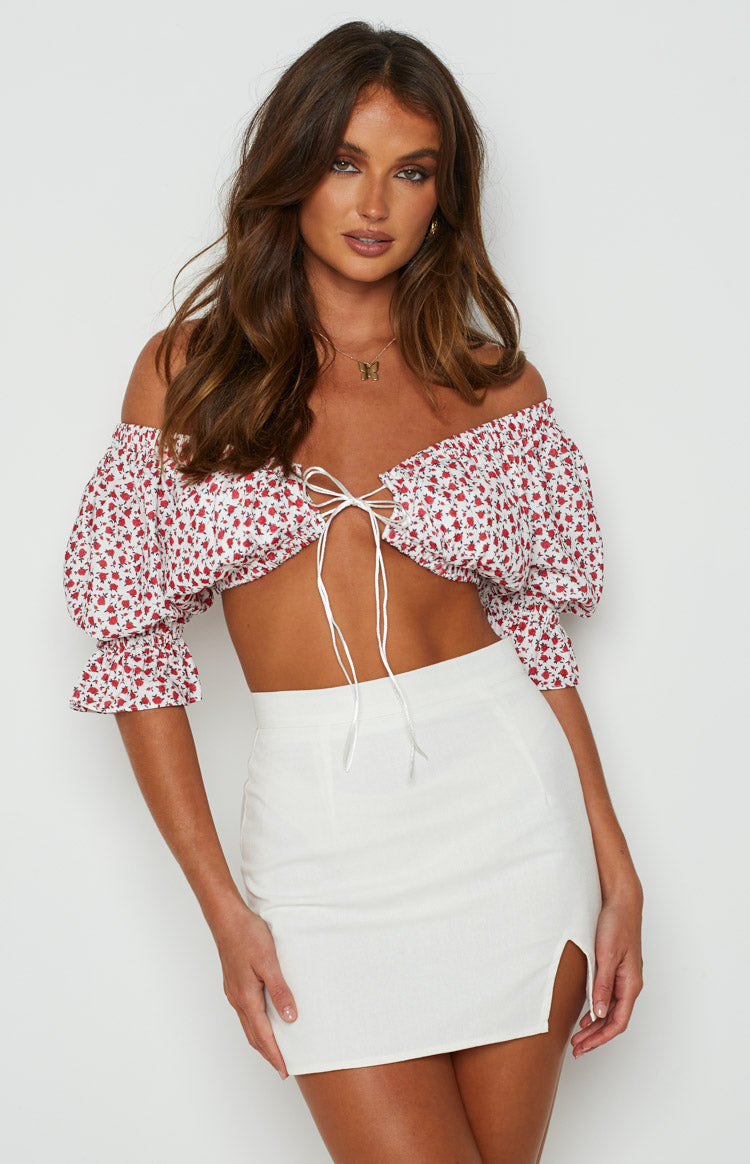 Beginning Boutique Alannah Crop Top White Floral white floral off-shoulder tie-front crop top with puff sleeves and elasticated cuffs