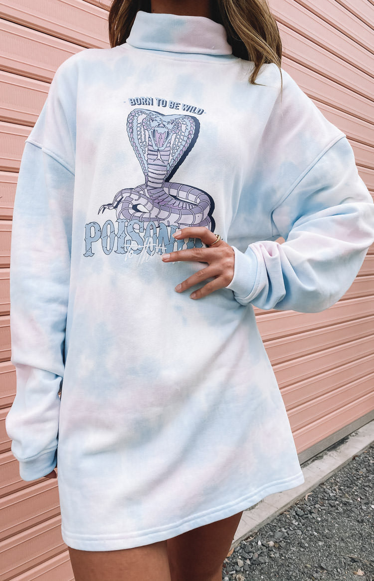 Light blue and pink tie-dye long sleeve sweater dress with a high roll neck and a bold cobra graphic