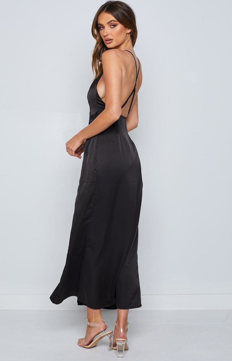 Side view of a black satin maxi dress with a low back and criss-cross spaghetti straps