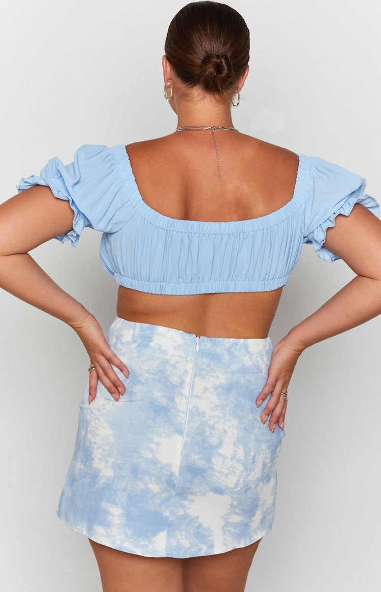 Light blue and white tie-dye denim mini skirt with a back zipper closure