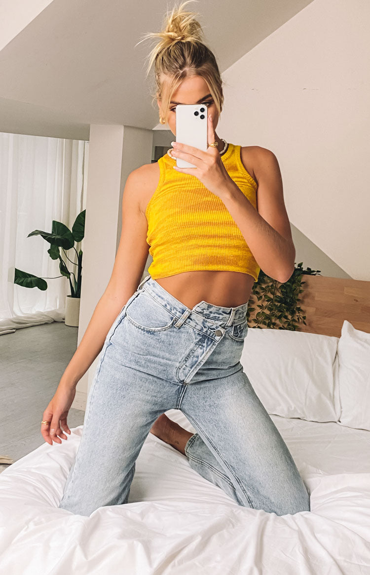 Yellow ribbed knit tank top with a high neckline and cropped fit