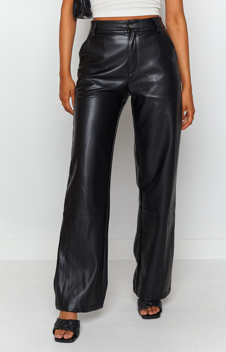 Black high-waisted PU pants with a wide-leg cut and front button closure
