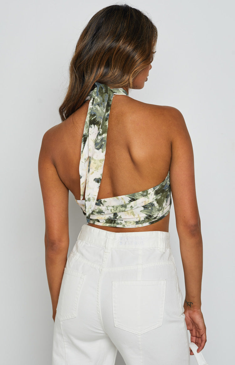 Green and white abstract print halter neck scarf top with an open back and wrapped detail