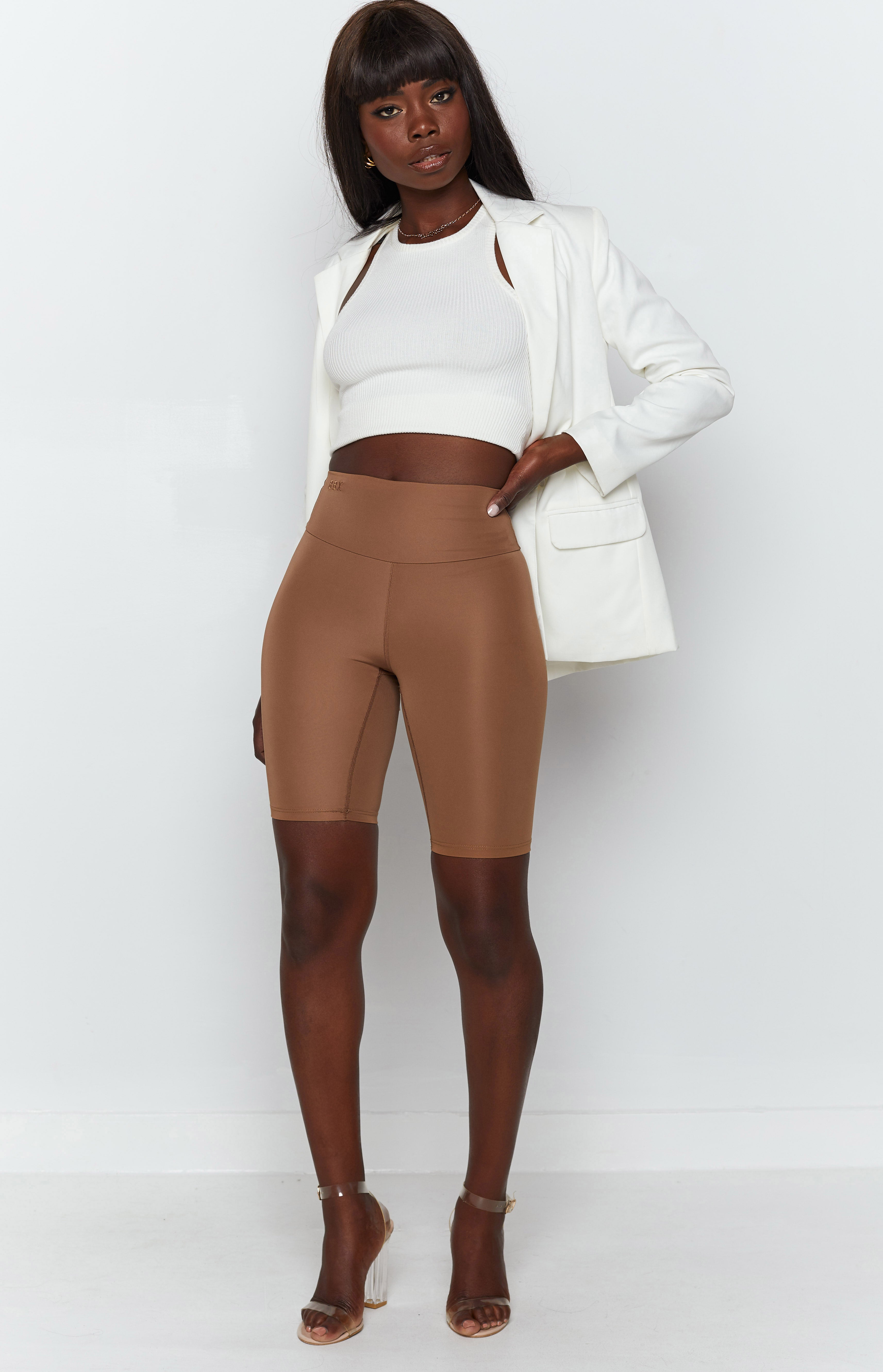 Toffee high-waisted bike shorts in smooth activewear fabric, body-con fit, knee-length
