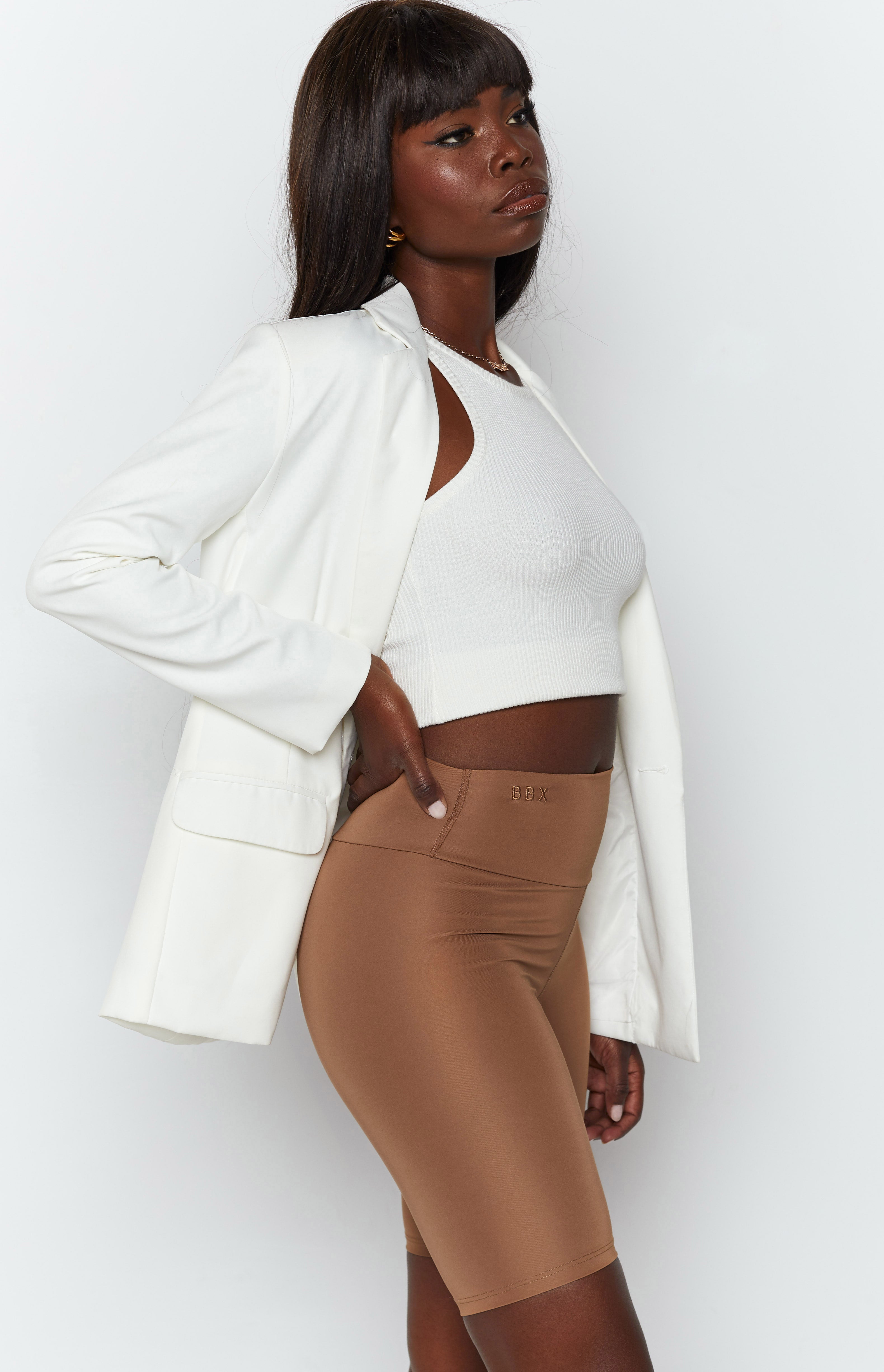 Toffee high-waisted bike shorts with a smooth stretch fabric and a subtle BBX logo on the waistband
