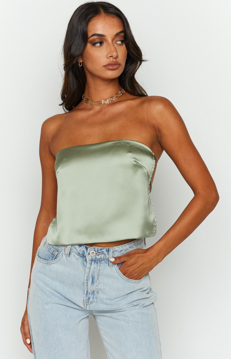Beginning Boutique Ibiza Olive Satin Strapless Top olive satin strapless bandeau top with a straight neckline and side lace-up detail