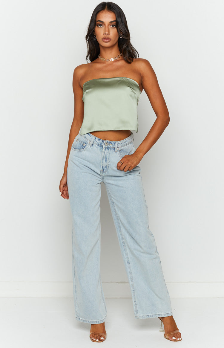 Front view of an olive satin strapless crop top with a straight hem