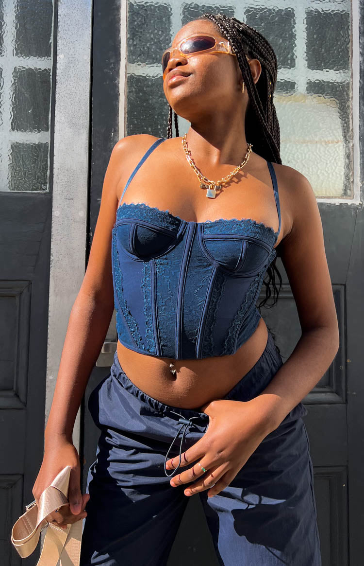 Beginning Boutique Evangeline Blue Lace Corset Top navy blue lace corset top with sweetheart neckline and thin straps