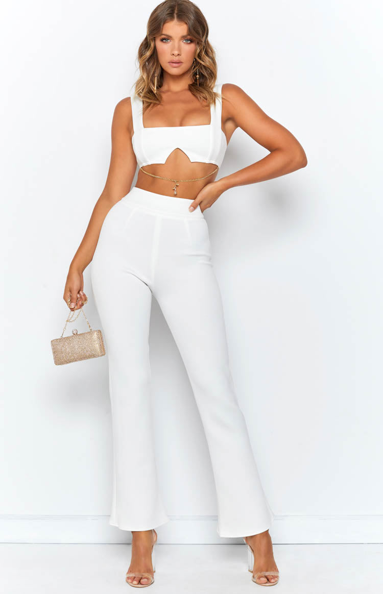 White structured crop top featuring a square neckline and a distinctive underbust cutout