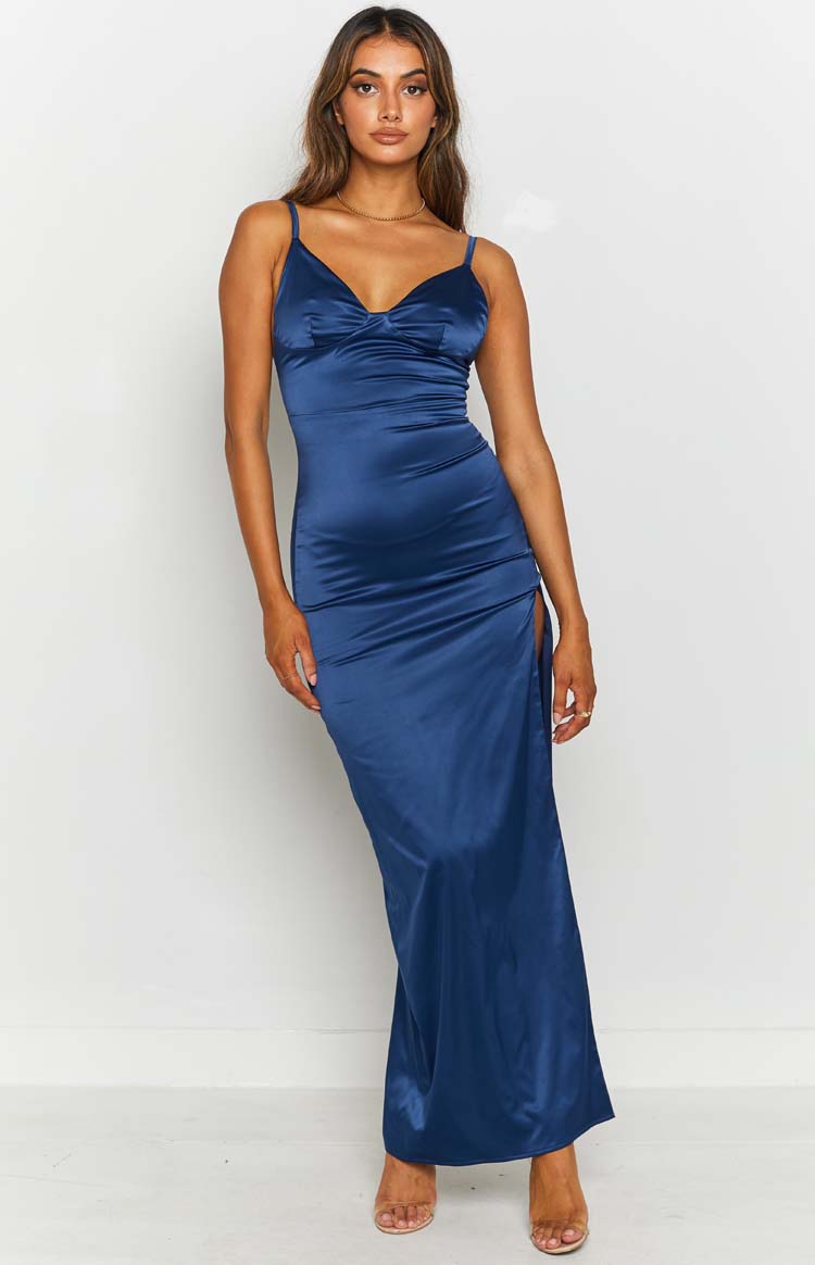 Navy satin formal dress with a ruched sweetheart neckline, thin straps, and a high side split