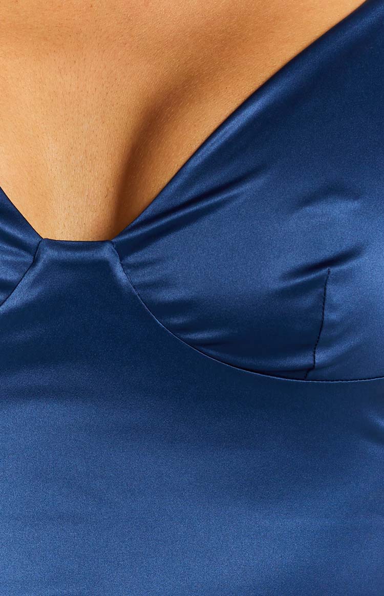 Navy satin formal dress with a deep V-neckline and structured bust seams