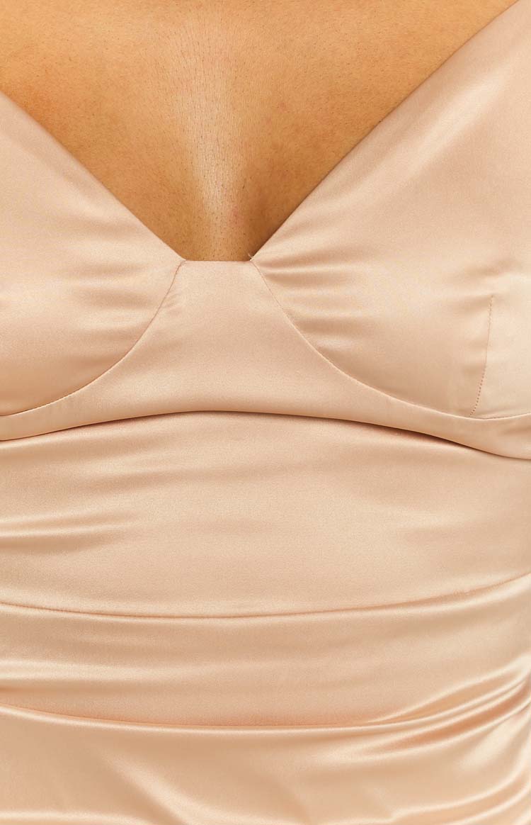 Champagne satin formal dress with a sweetheart neckline and delicate bust draping