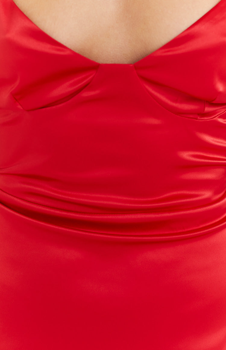 Close-up of the red satin sweetheart neckline with gathered bust detail and ruched waist of the maxi dress