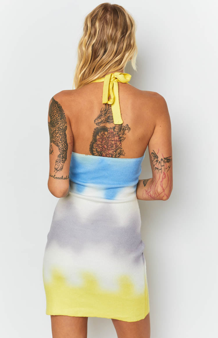 Yellow halter neck tie-dye knit mini dress with blue, white, and grey gradient shades