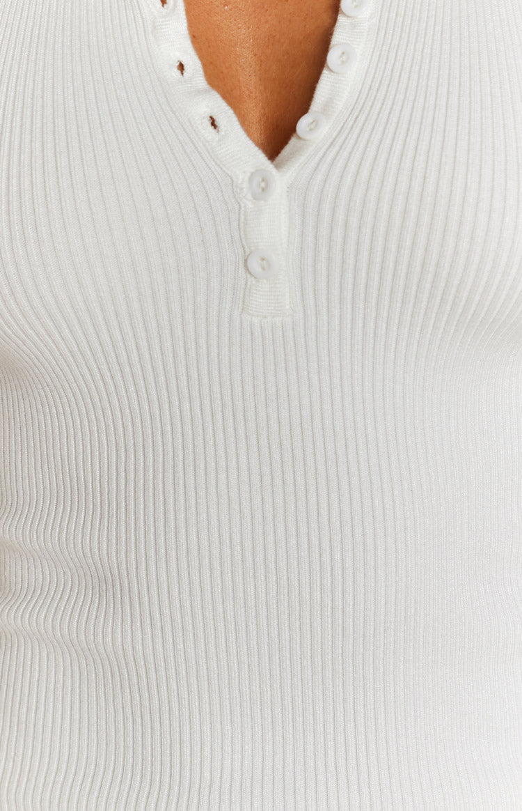 White ribbed knit dress with a V-neckline and a five-button placket