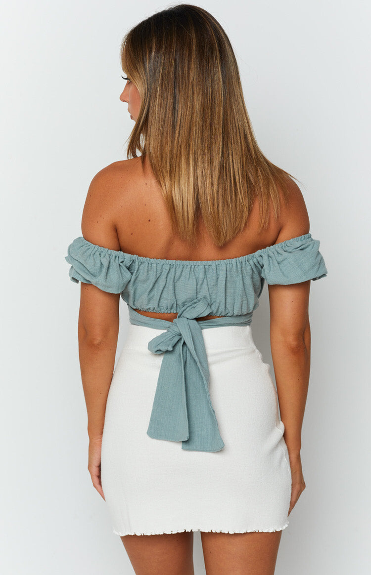 Sage off-the-shoulder crop top with elasticated back, short puff sleeves, and long waist ties knotted at the back