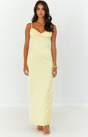 Honey yellow maxi dress with a ruched V-neck bodice, thin spaghetti straps, and a gathered side seam detail