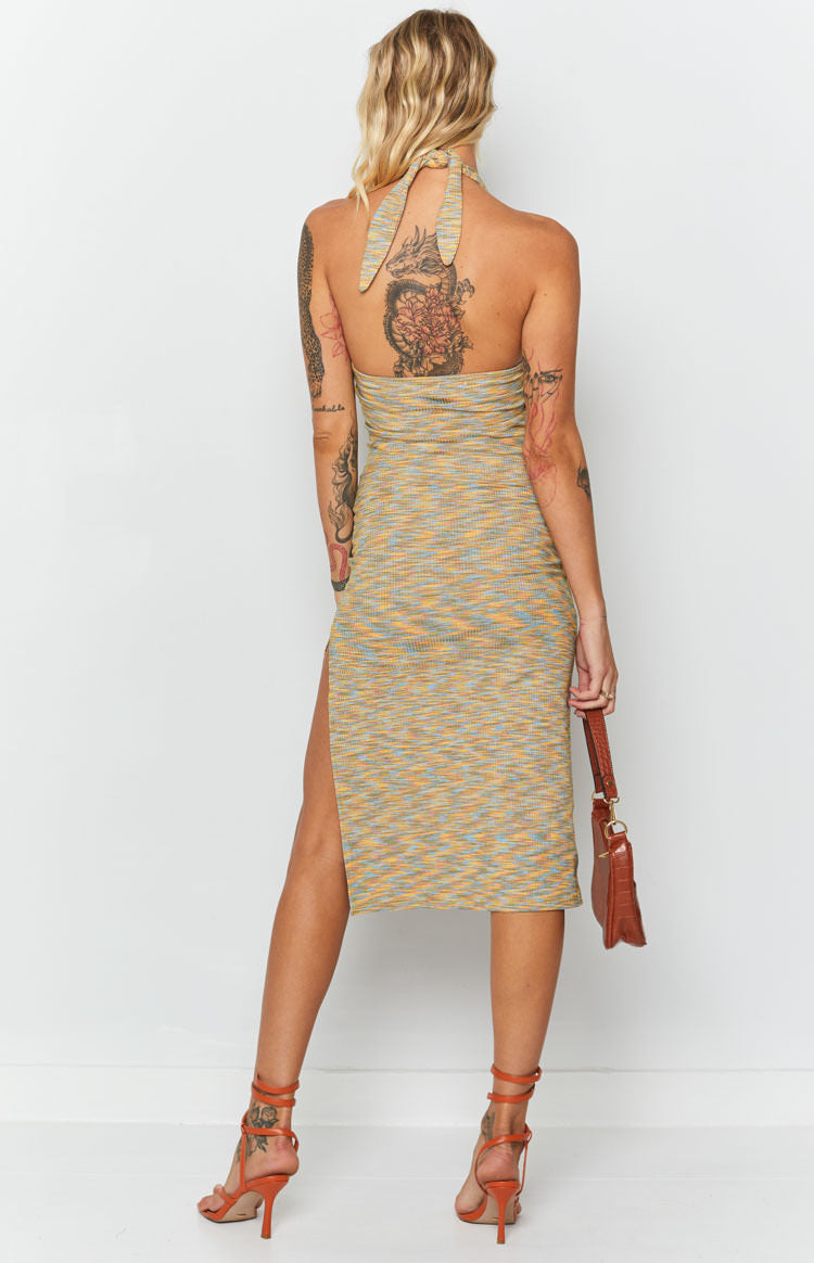 Halter tie neckline on a multi spacedye knit midi dress with an open back and high side slit