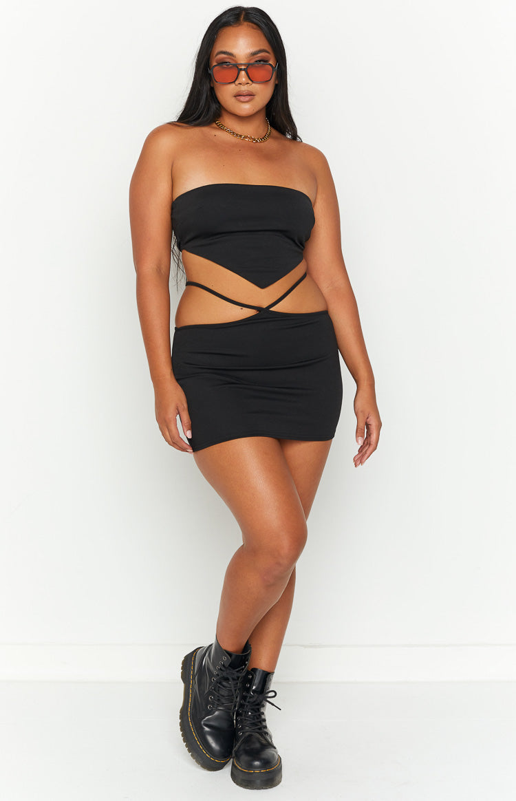 Black strapless bandana top with a pointed hem and criss-cross ties around the midriff