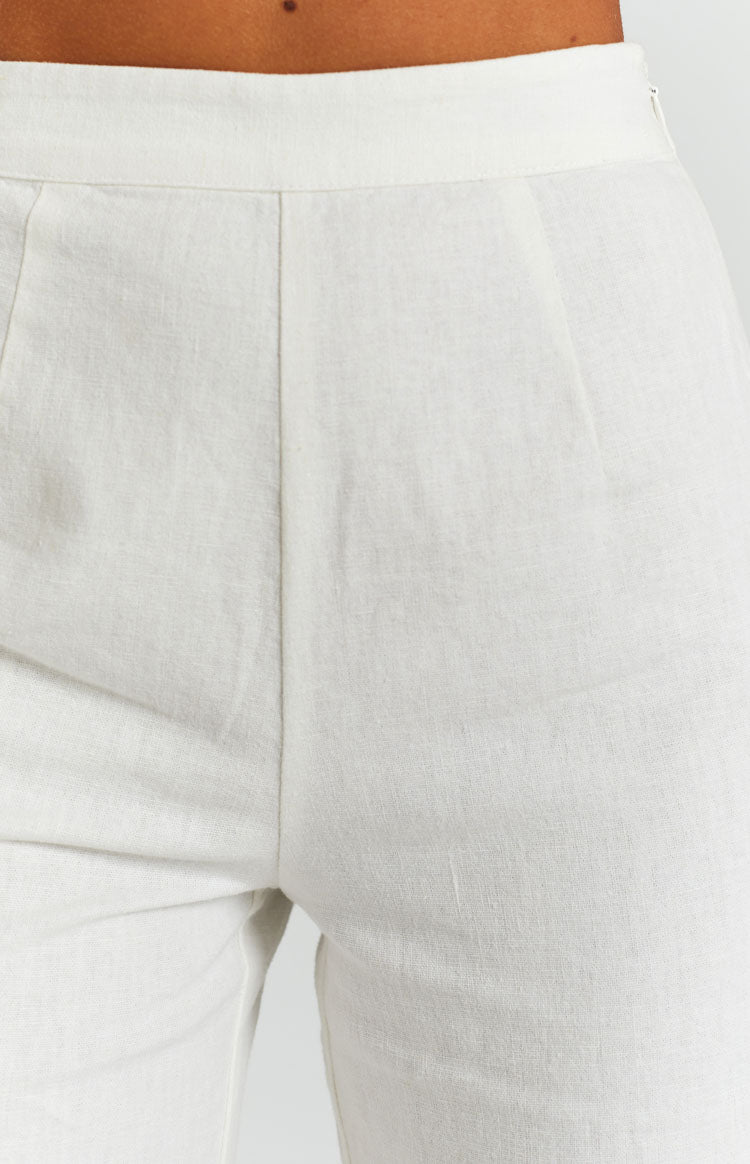 White linen pants with a textured weave, featuring a high waistband and a subtle side zipper