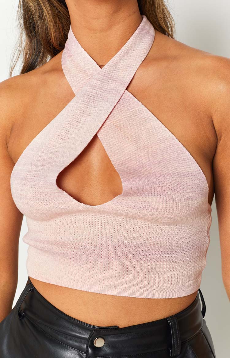 Pink ombre ribbed knit top with wide crossed halter straps and a central sternum cutout