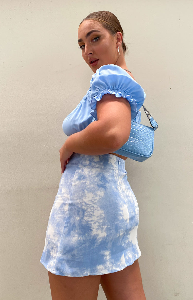 Blue and white tie-dye denim mini skirt with a high waist and subtle A-line flare