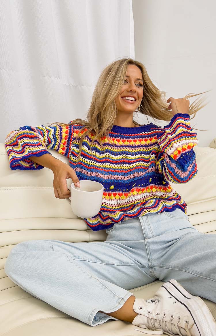 Blue multi-coloured striped Long Weekend Sweater with open knit, crew neck, three-quarter bell sleeves, and scalloped hem